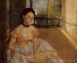 Frau auf Balkon Sitz