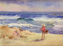 Junge auf dem Sand