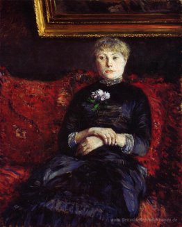 Frau sitzt auf einem roten Sofa Flowered