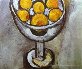 Eine Vase mit Orangen
