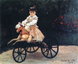 Jean Monet auf einem Mechanischer Pferde