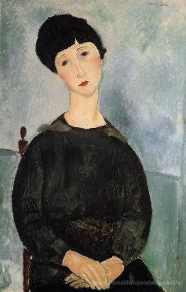 Sitzende junge Frau